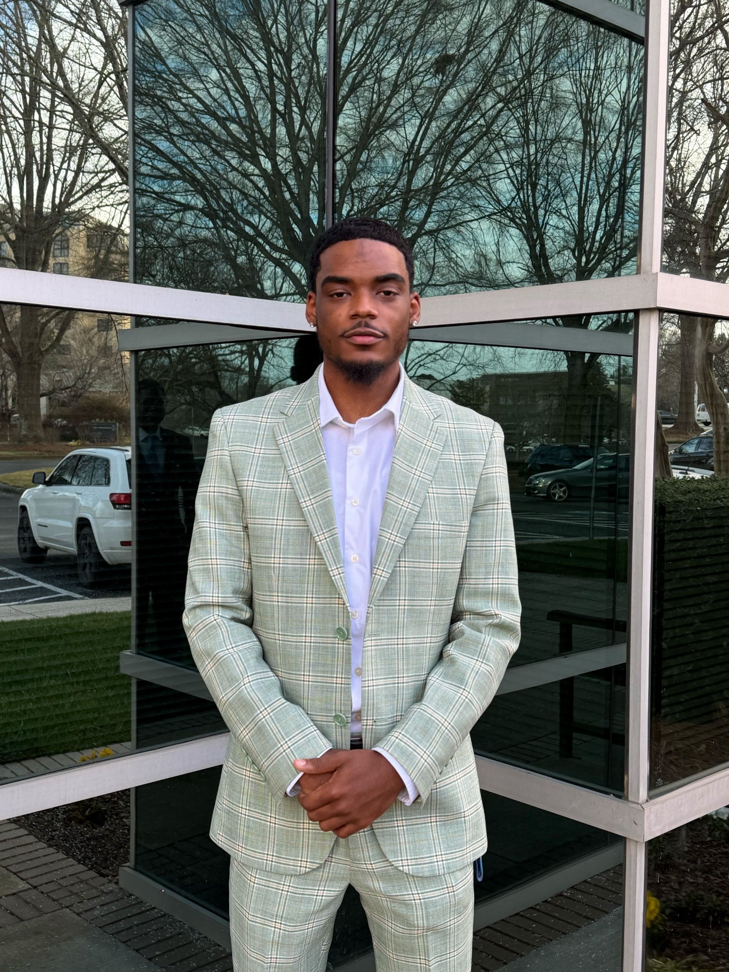 Fifth Leaf Strategies team members in professional attire outside corporate offices