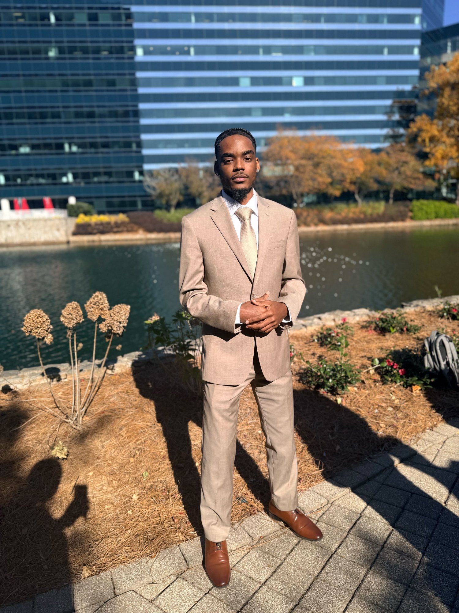 Team member working at a desk with an iMac in a modern office